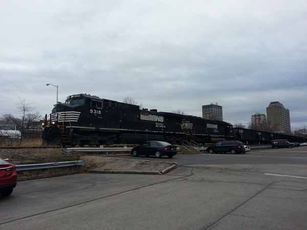 Northbound loaded coal train through Manchester