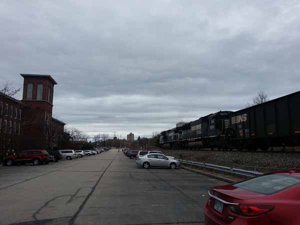 Northbound loaded coal train through Manchester
