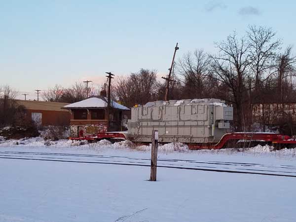 An autotransformer for Eversource Energy sits in the Manchester freight yard