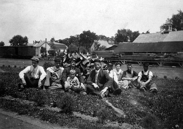 Railroad employees in the flower garden