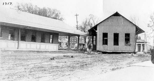 Moving of old depot past the new, Poultney, Vermont