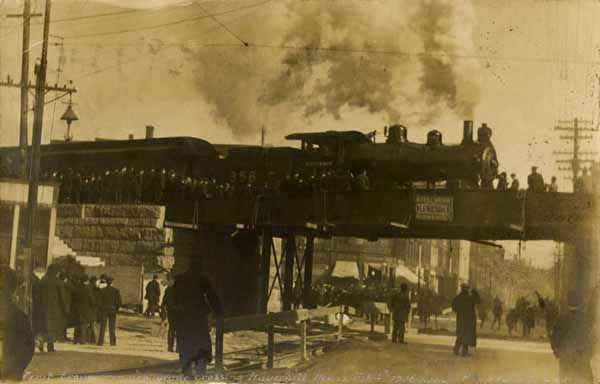 Boston & Maine Railroad #356 prepares for the first crossing over the new Merrimack River bridge