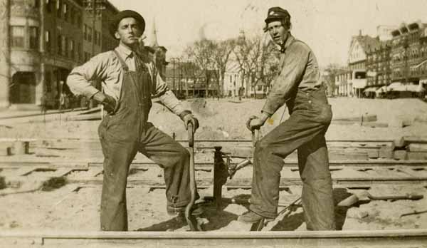 Track workers at the Main Street crossing, Keene