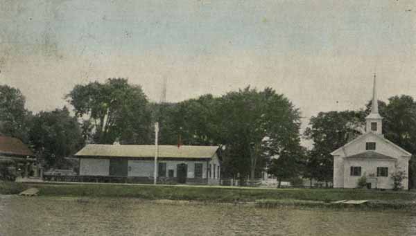 Josselyn's Store, Depot and Church from Harbor Pond, Townsend Harbor, Massachusetts